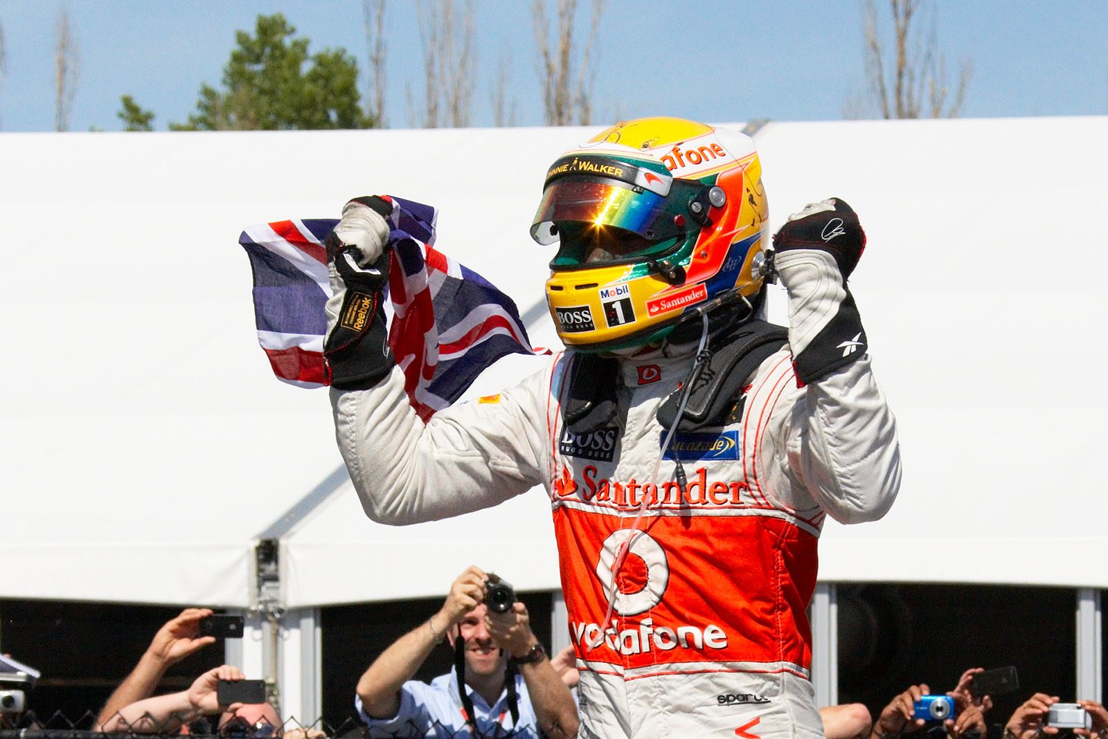 Race winner Lewis Hamilton of McLaren Mercedes celebrates in parc ferme