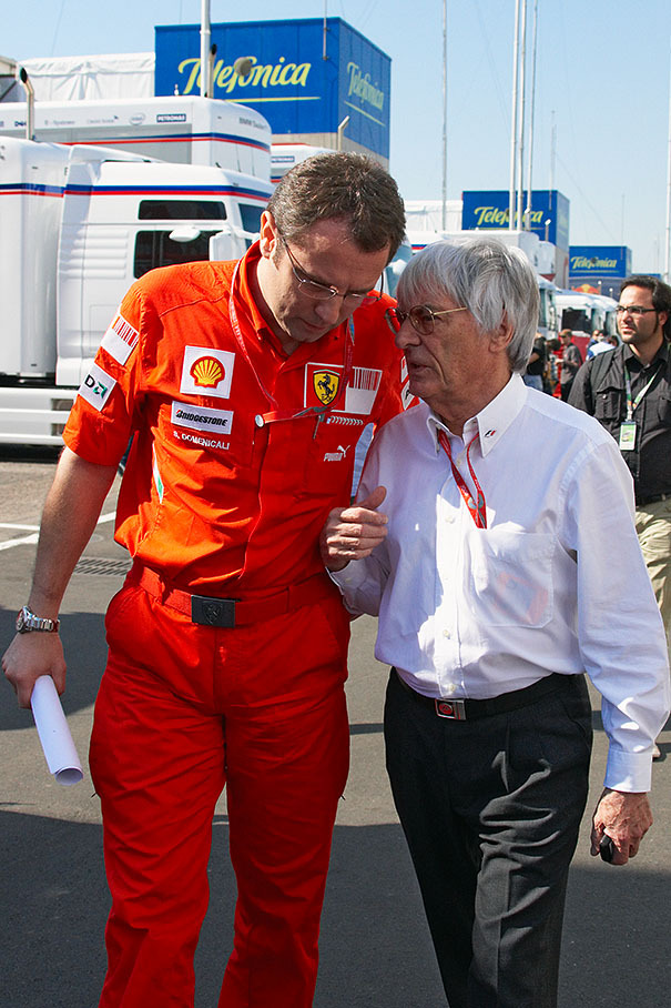 Bernie Ecclestone talks to Ferrari team boss Stefano Domenicali