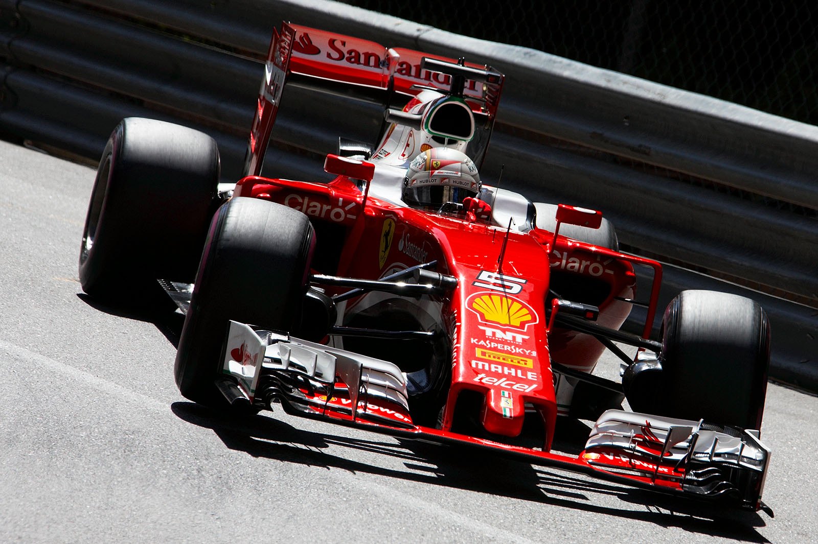 Sebastian Vettel drives his Ferrari at Mirabeau corner during qualifying session for the Monte Carlo Grand Prix, 2016