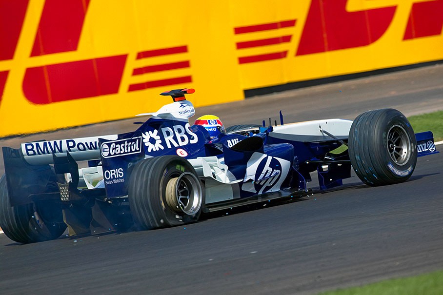 Mark Webber's BMW WIlliams suffering a puncture during the race.