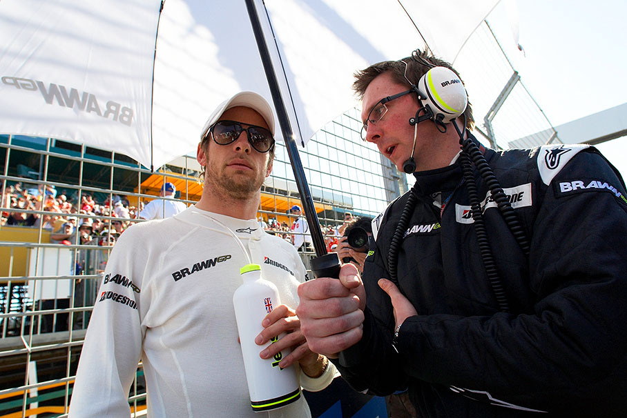 Polesitter Jenson Button with Brawn GP's race engineer Andrew Shovlin on the grid