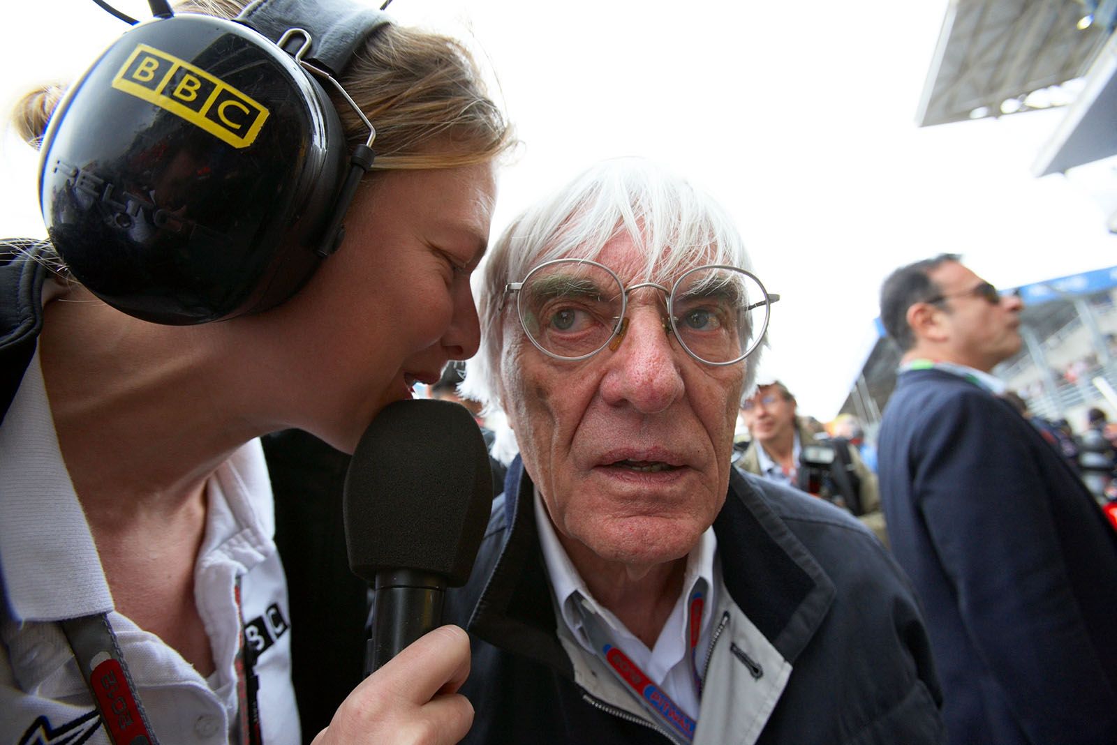 Formula One CEO Bernie Ecclestone is interviewed at the grid