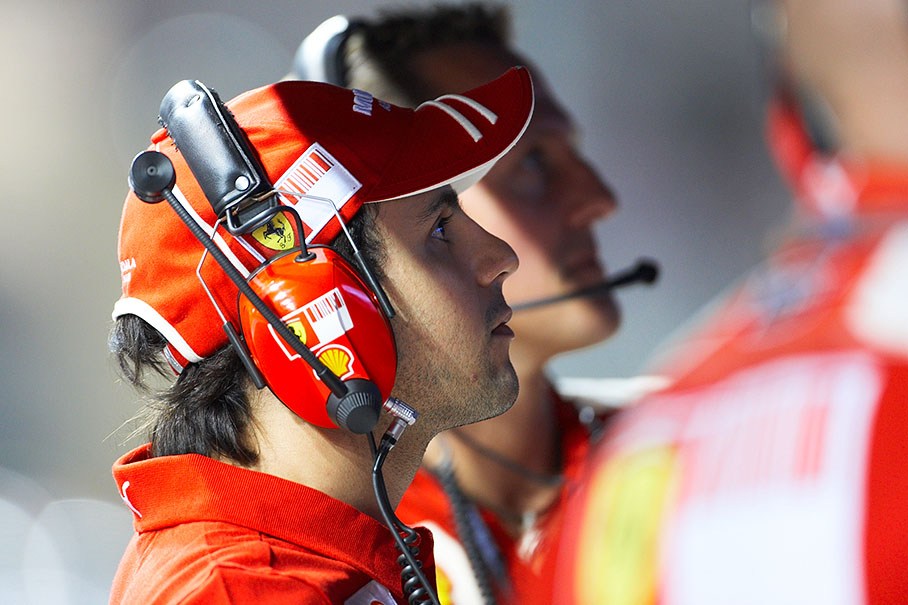 Felipe Massa with Michael Schumacher at Ferrari's pit wall command center