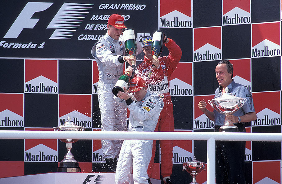 Champagne shower for race winner Mika Häkkinen