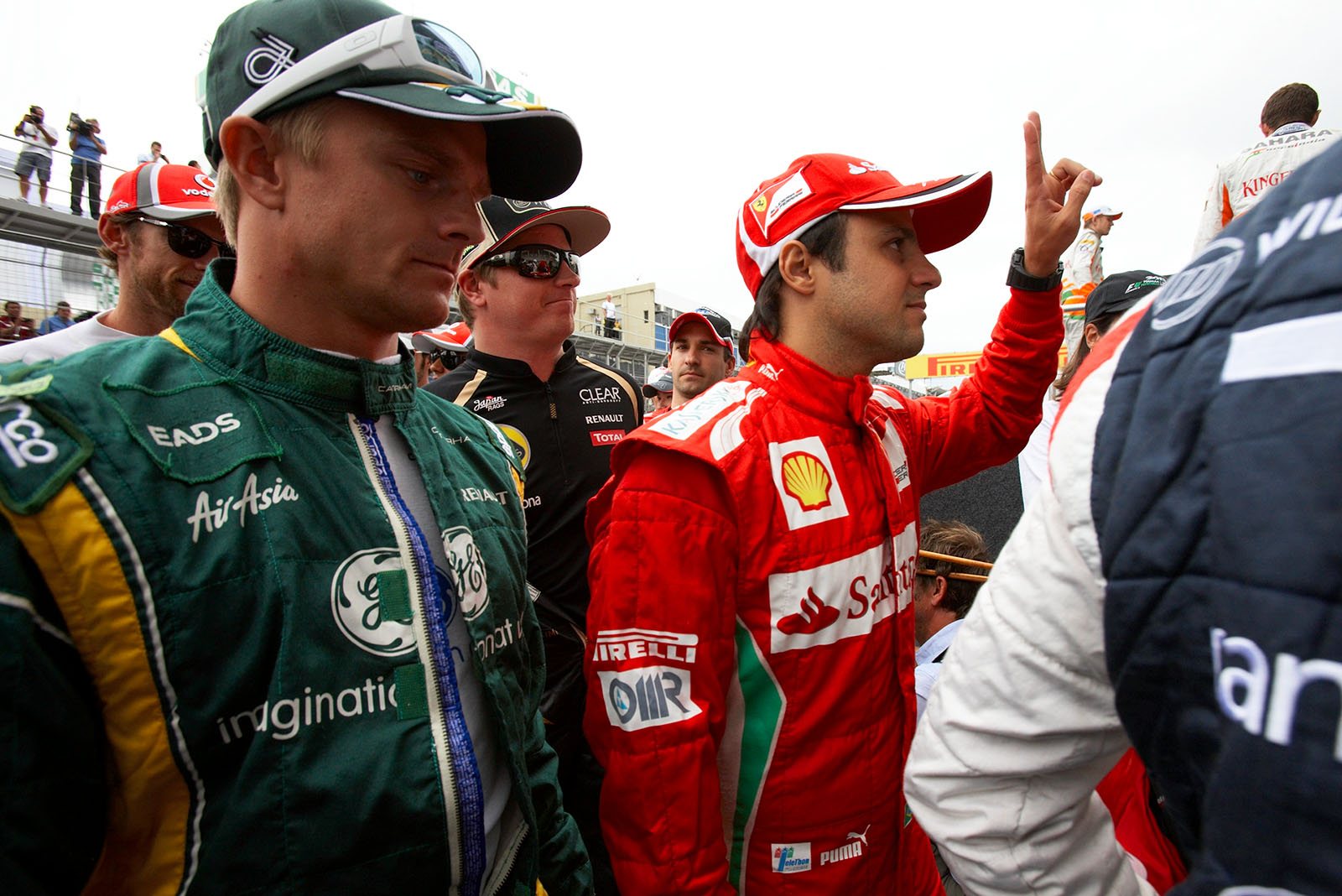 Felipe Massa and Heikki Kovalainen eagerly attend the drivers presentation