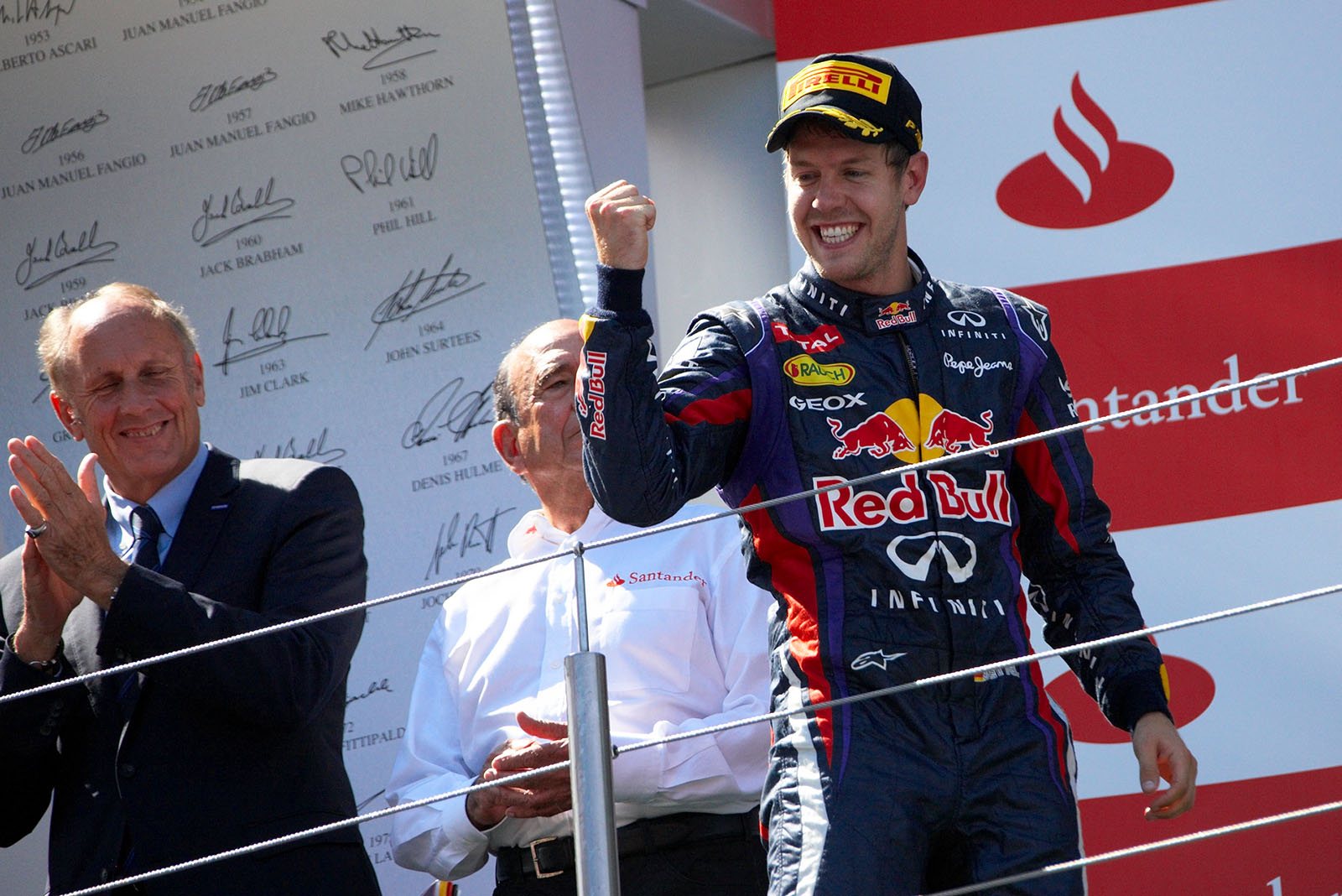 Race winner Sebastian Vettel of Red Bull Racing celebrates on the rostrum, gaining a victory at his home Grand Prix for the first time