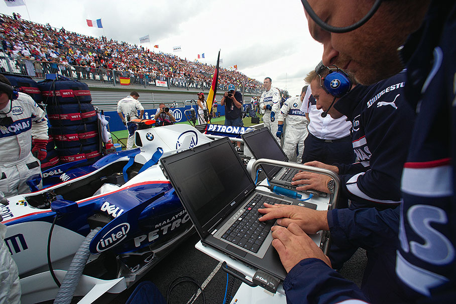 BMW Sauber engineers check Heidfeld's car electronics
