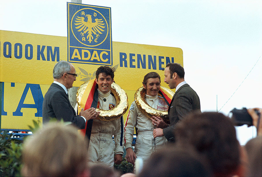 Brian Redman (GB) and Jo Siffert (CH) celebrate their victory on the Nuerburgring podium