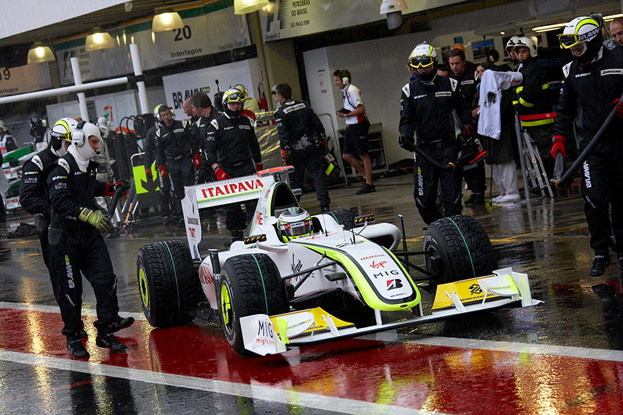 Jenson Button exits Brawn Grand Prix pits - on extreme wet tyres which results in a disappointing result