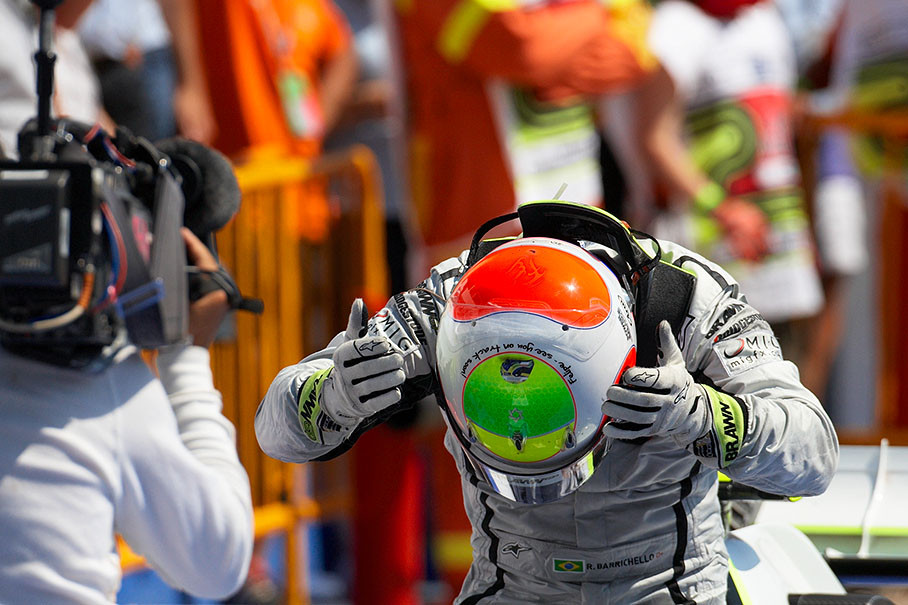 Brawn Grand Prix' Rubens Barrichello celebrates in parc ferme and dedicates his victory to his injured friend Massa