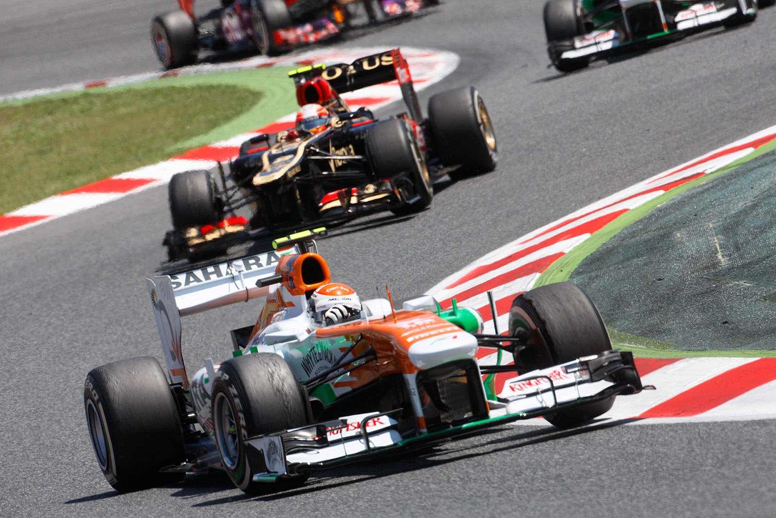 The midfield with Adrian Sutil, Force India, and Romain Grosjean, Lotus, Spanish Grand Prix, Barcelona, 2013