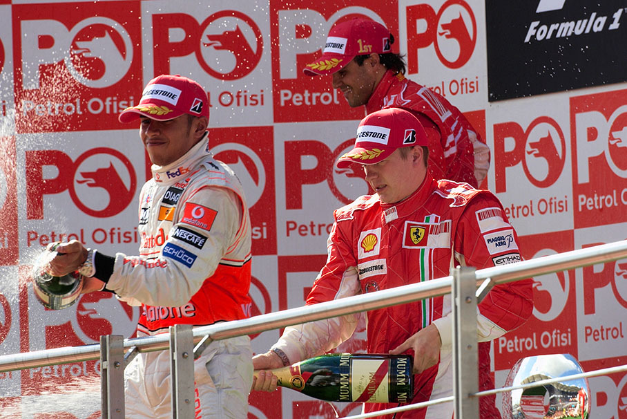 Champagne shower from Hamilton and Raikkonen