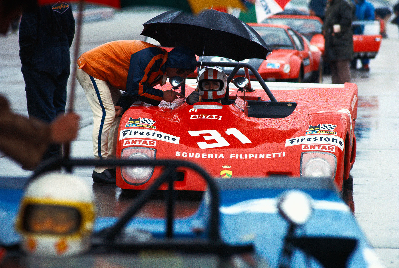 Jacques Cochet's (CH) Lola T290 Ford HU11 on a rainy grid