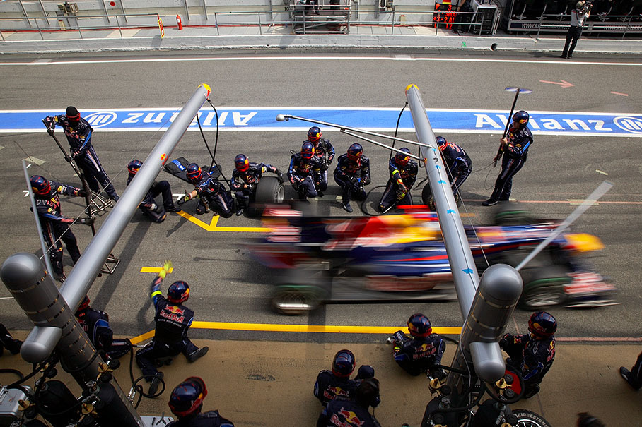 Sebastian Vettel ejects from Red Bull Racing pits