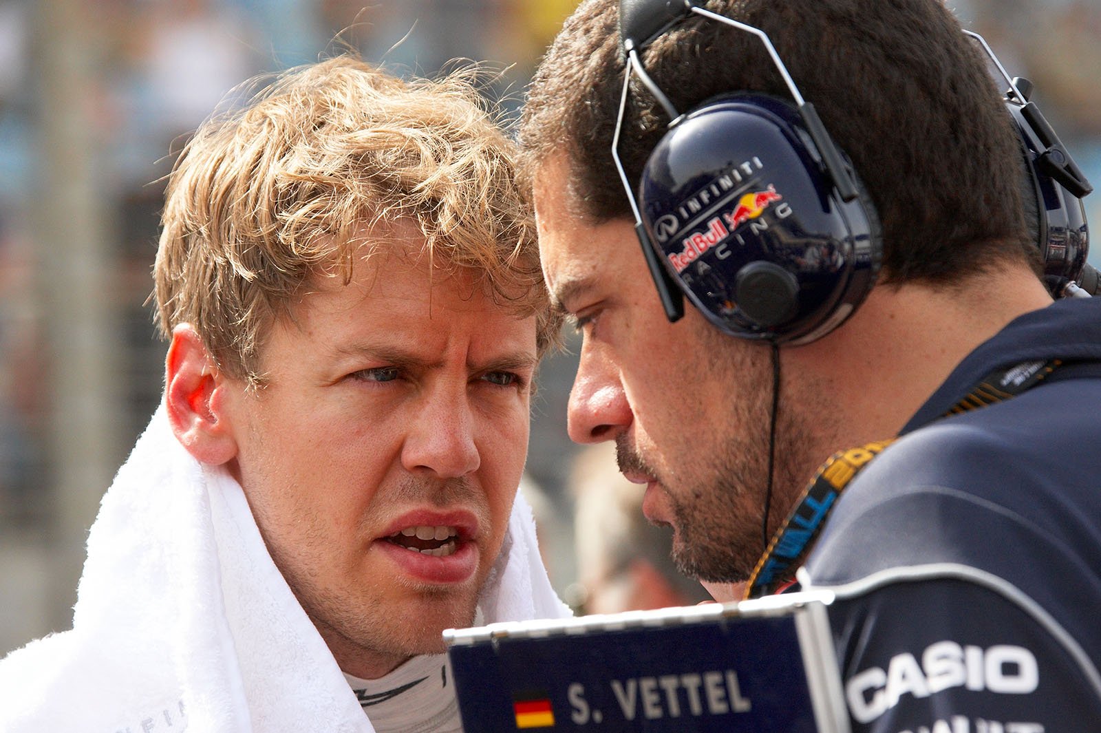 Sebastian Vettel talks to Red Bull Racing race engineer Guillaume Rocquelin on the grid