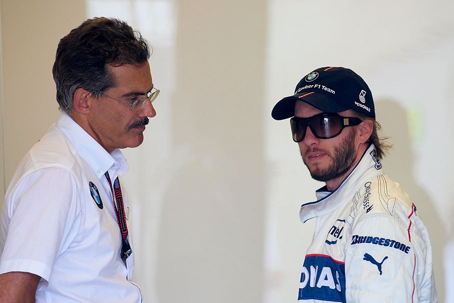 BMW motorsport director Dr. Mario Theissen with his driver Nick Heidfeld