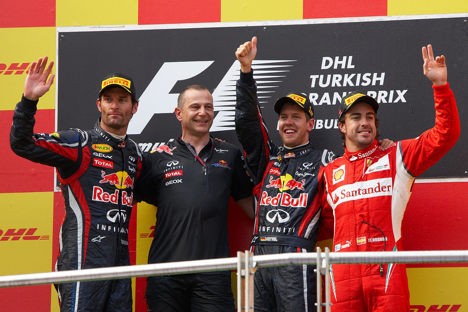 Final podium ceremony group photo of second placed Mark Webber of Red Bull, chief engineer Mark Ellis, race winner Sebastian Vettel and third placed Fernando Alonso of Ferrari