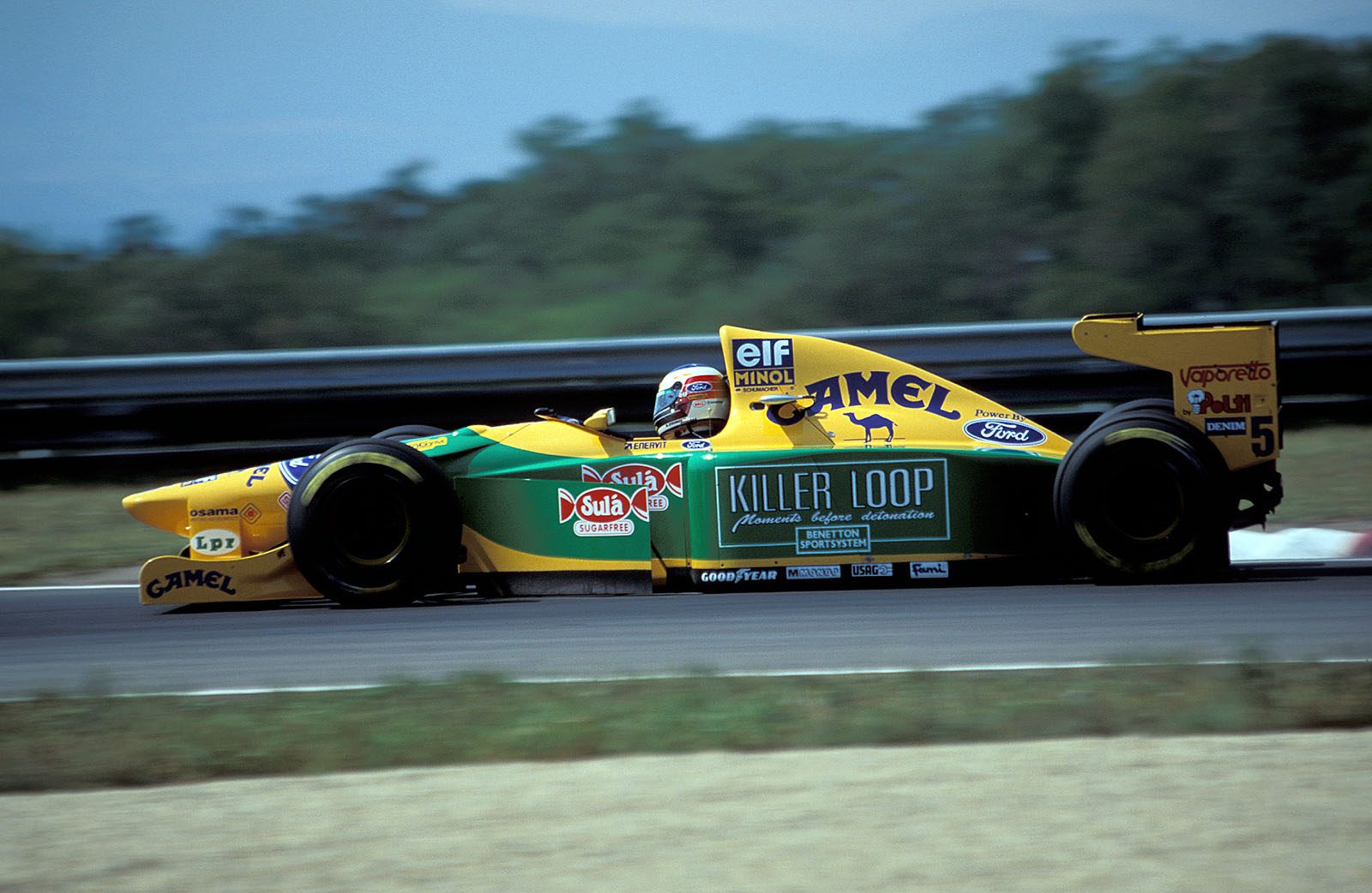 Michael Schumacher on Benetton-Cosworth, Hungarian GP 1993 (different Benetton logo on side pod in Hungary only)