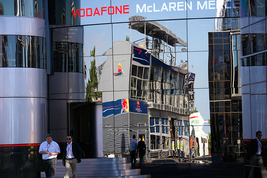 Mercedes Motorsport director Norbert Haug and former F1 and DTM driver Jean Alesi leave together the glittering palace of McLaren