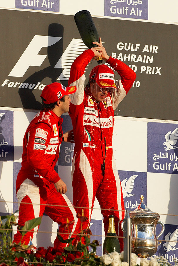 Race winner Alonso pours rose water over his head