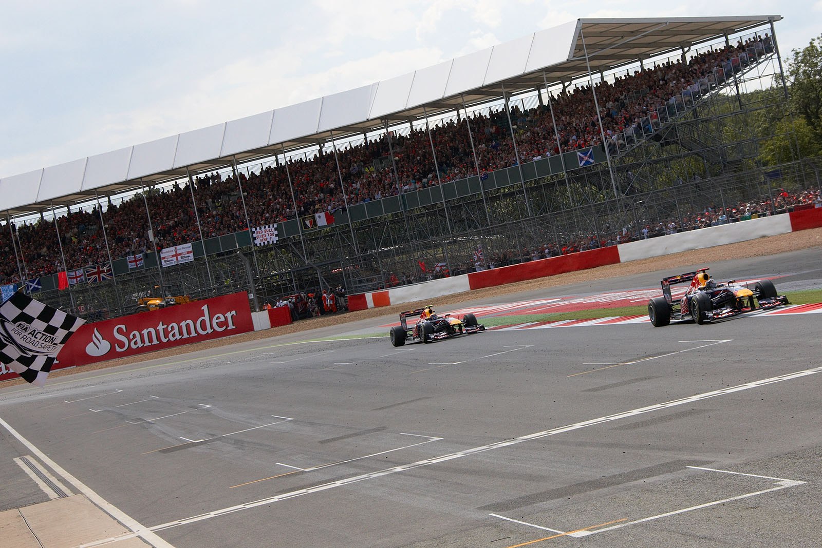 Vettel and Webber of Red Bull finish as second and third