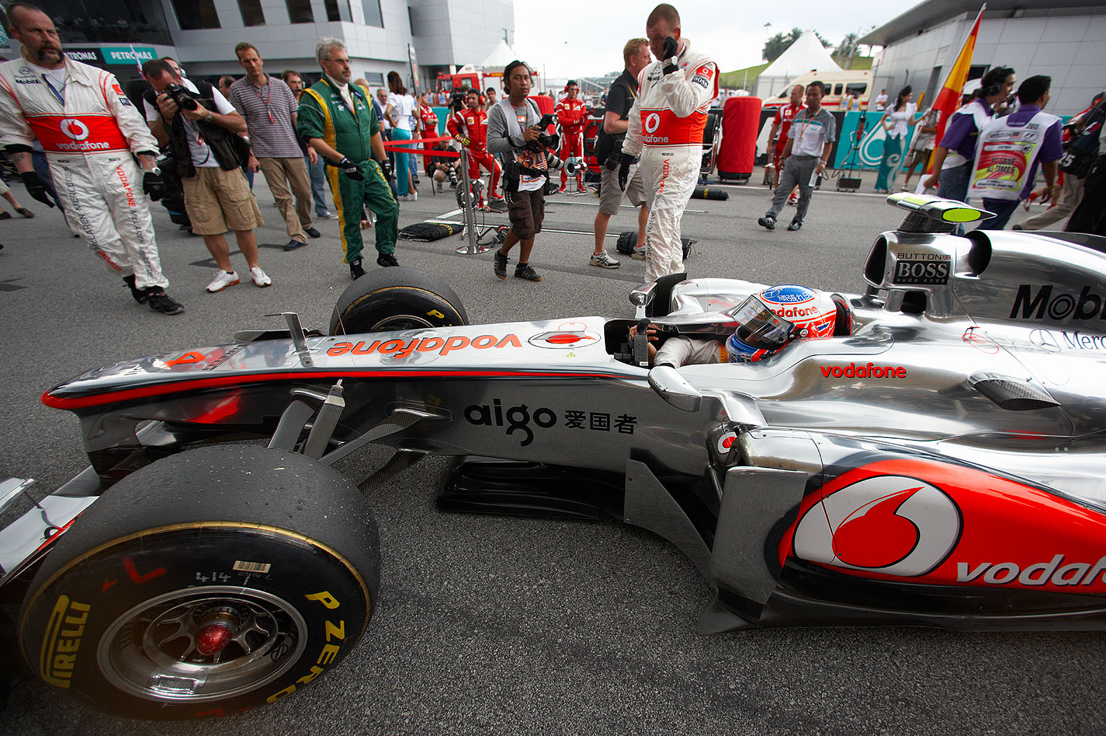 Jenson Button's McLaren Mercedes rolls to fourth grid position