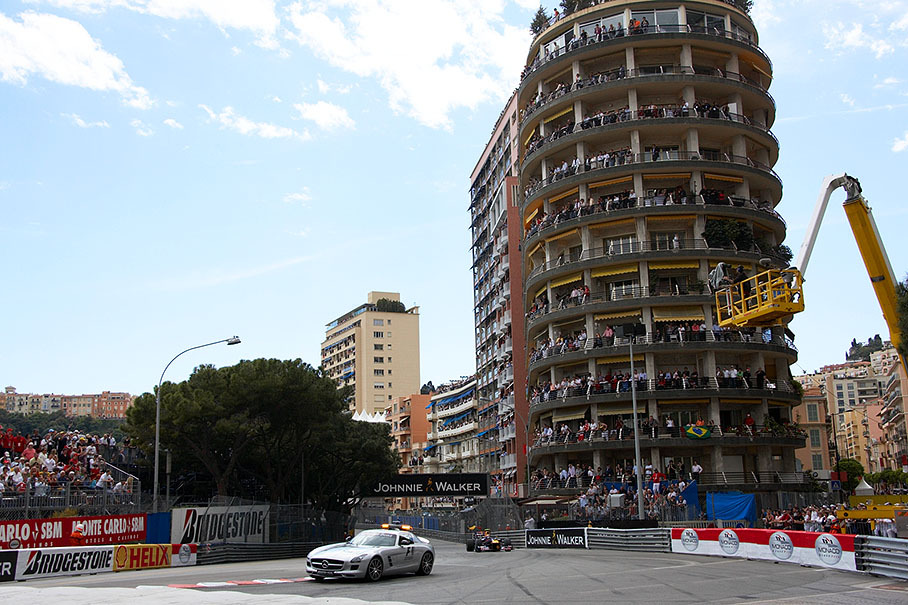 The safety car deploys in front of race leader Webber