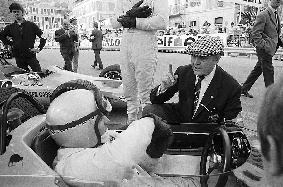 The Clerk of the Course for the Monaco Grand Prix Louis Chiron in discussion with Bruce McLaren, Monaco 1968