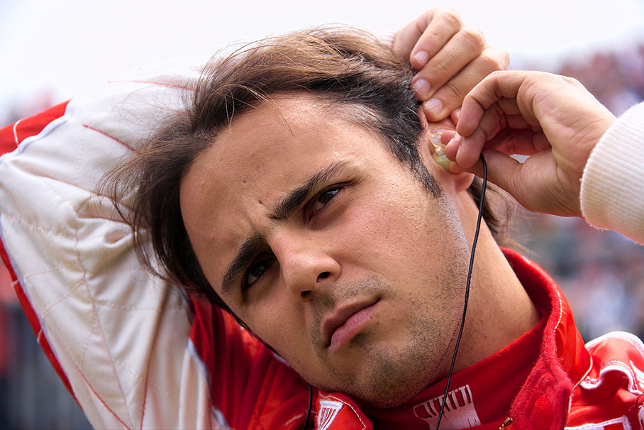 Felipe Massa plugs his earphones