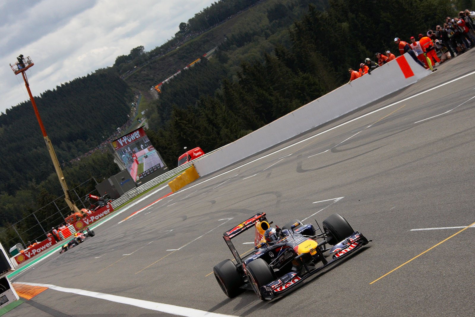 Sebastian Vettel of Red Bull Racing wins the Belgian Grand Prix and probably secures his second World Championship