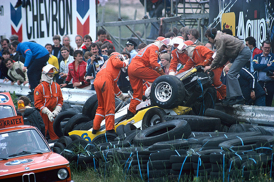 On lap 22 Rene Arnoux' Renault went straight into the barriers at Tarzan when a wheel fell off. The monocoque broke but absorbed the impact and the Frenchman could emerge unscathed.