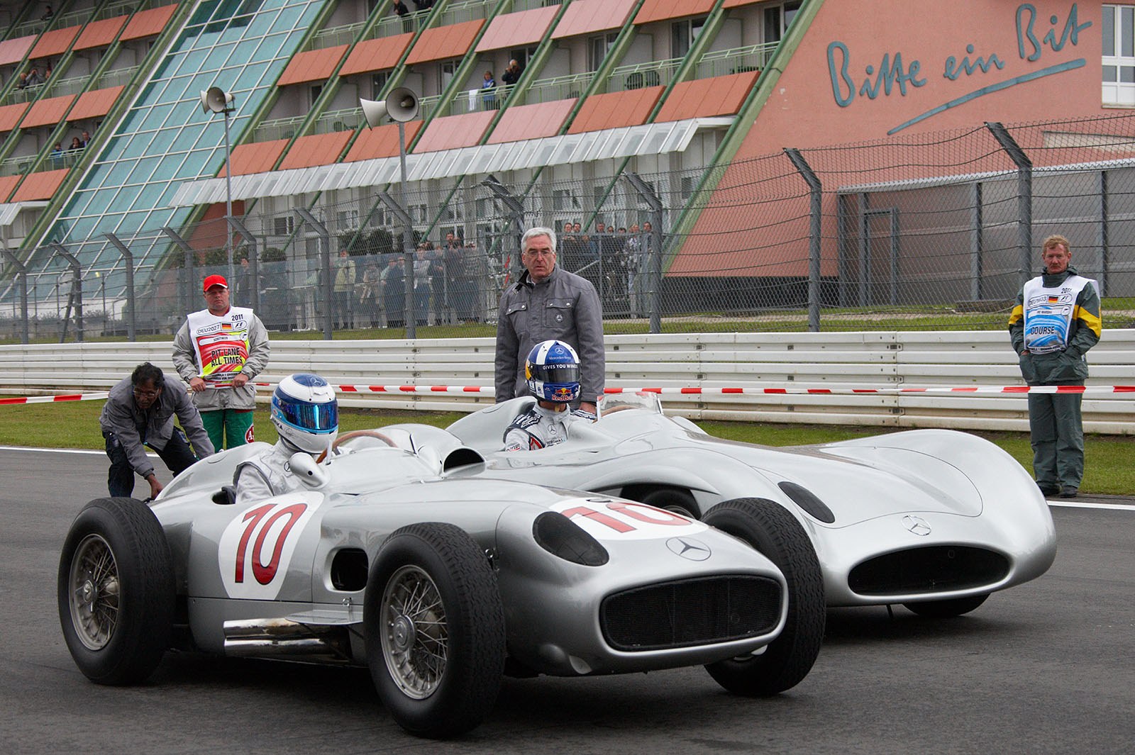 Two silver arrows starting for a display lap with the former McLaren Mercedes dream team drivers David Coulthard and Mika Hakkinen