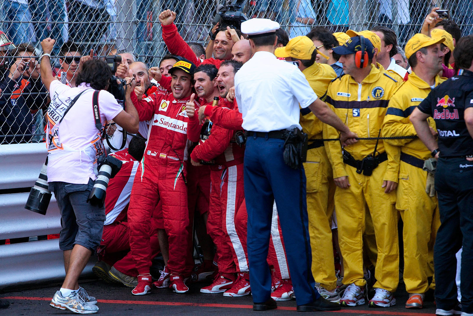 Fernando Alonso celebrates with his team.