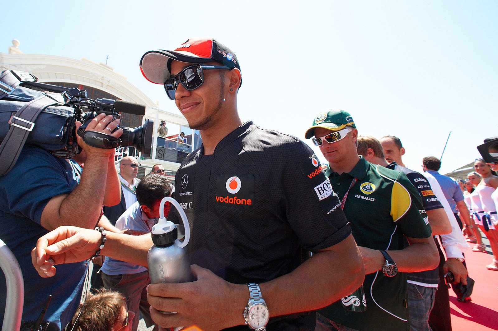 Lewis Hamilton walks to drivers parade