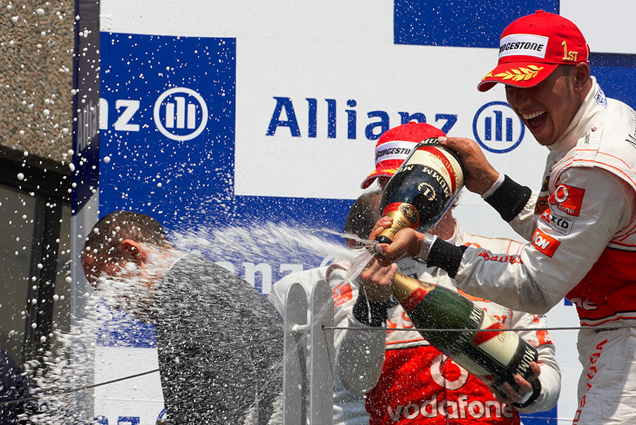 Race winner Lewis Hamilton sprays champagne
