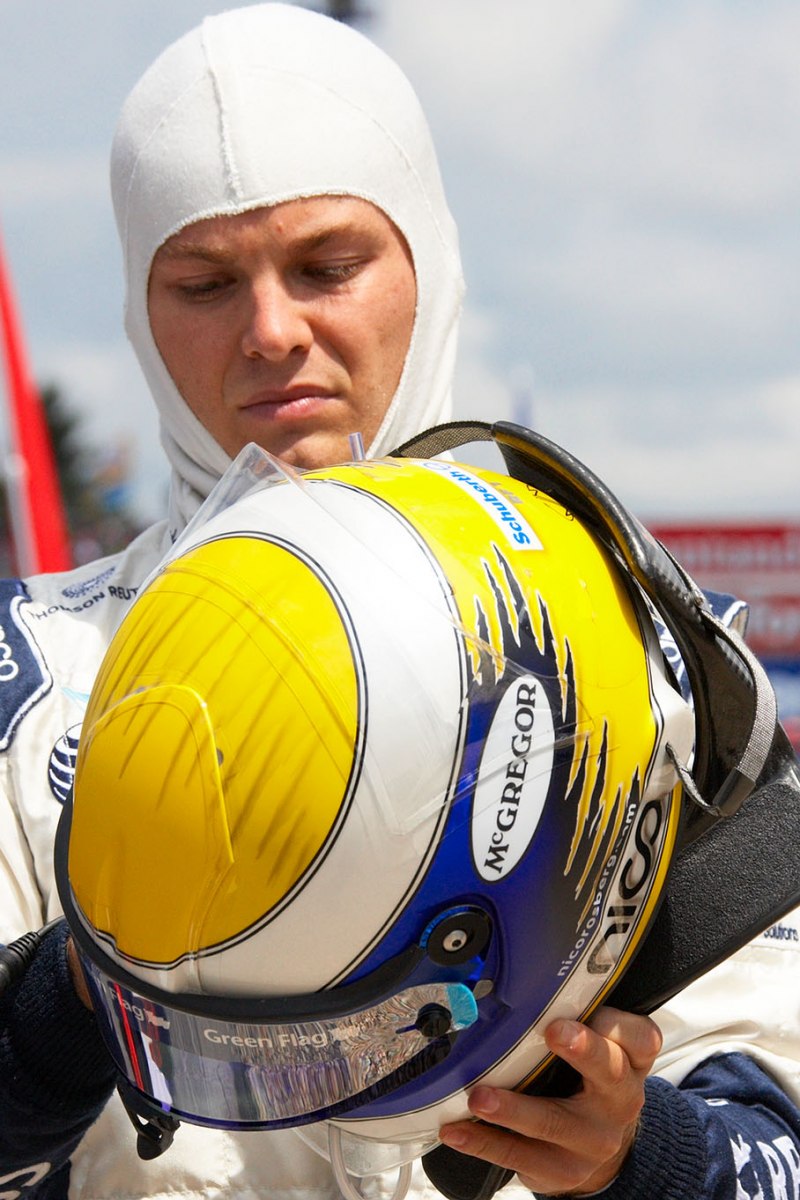 Nico Rosberg puts his helmet on