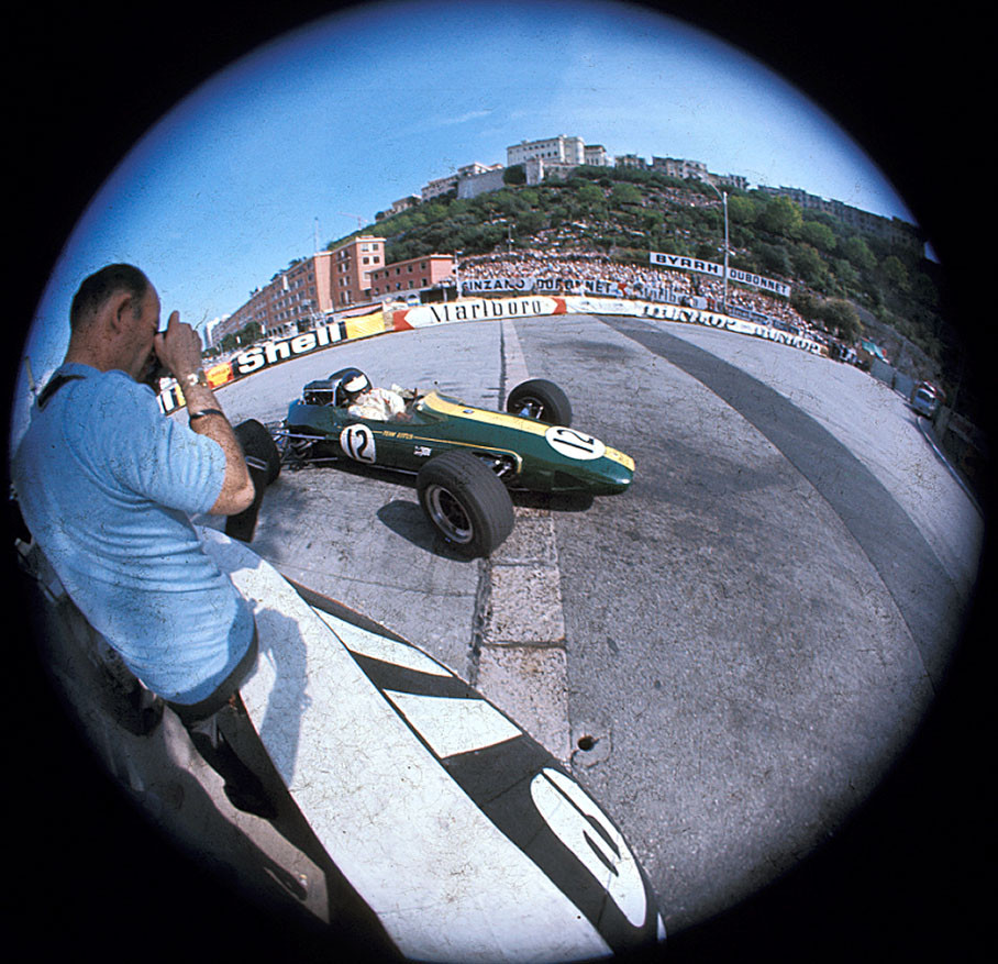 At Gasometre curve, Englishman Geoffrey Goddard photographs his idol Jim Clark in front of the famous rock of Monaco.
