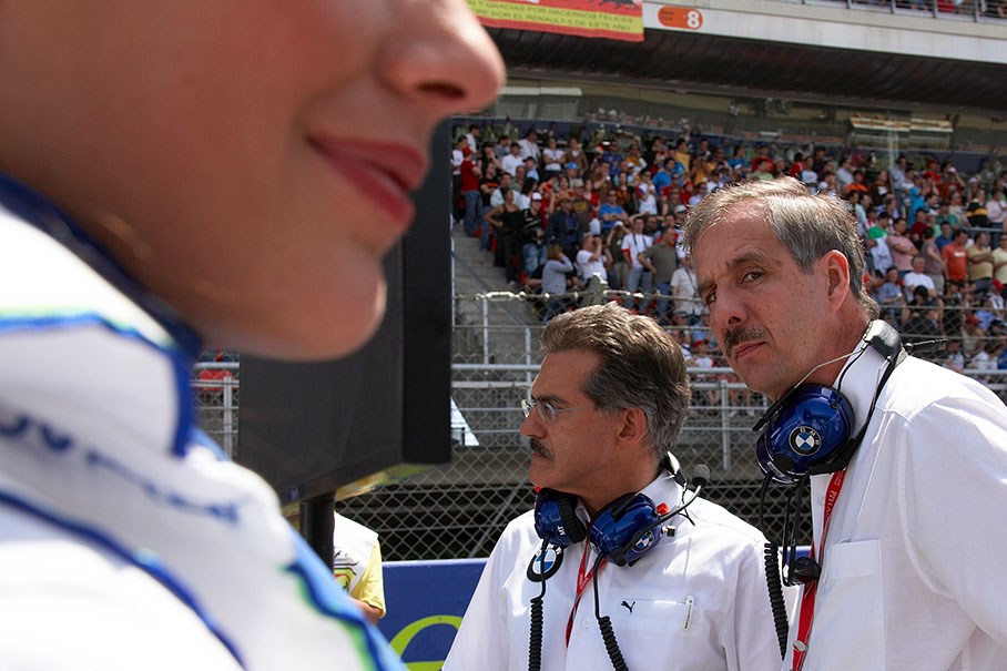 Klaus Draeger, BMW member of the board, on the grid with BMW Motorsport director Dr. Mario Theissen, casts a suspicious glance at the curious snapper :)