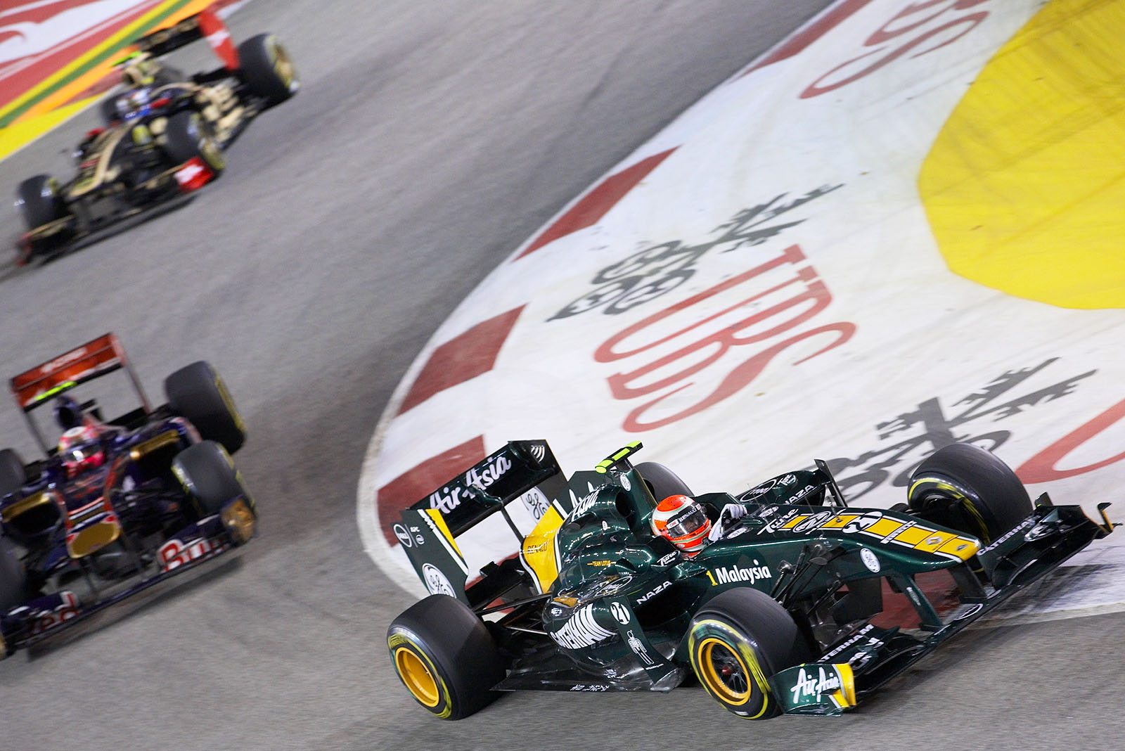 Jarno Trulli, Team Lotus, in front of Alguersuari and Petrov