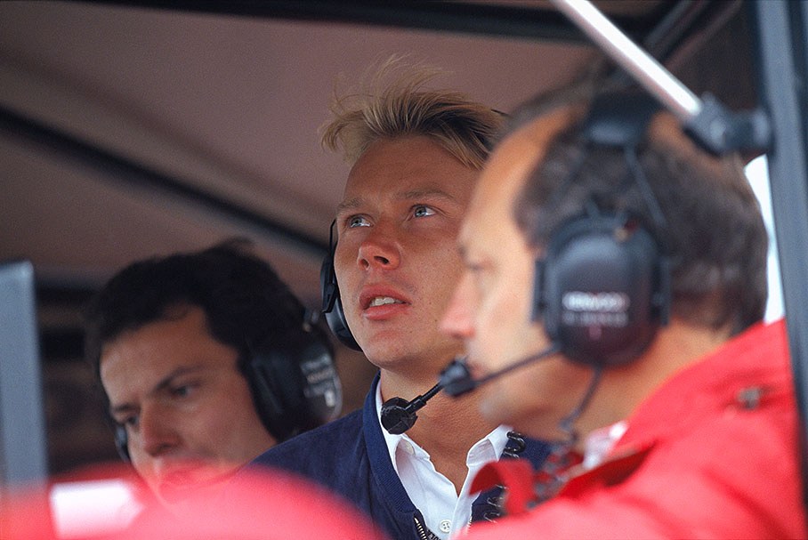 Promising new test driver Mika Hakkinen at the McLaren pit wall command centre with team boss Ron Dennis