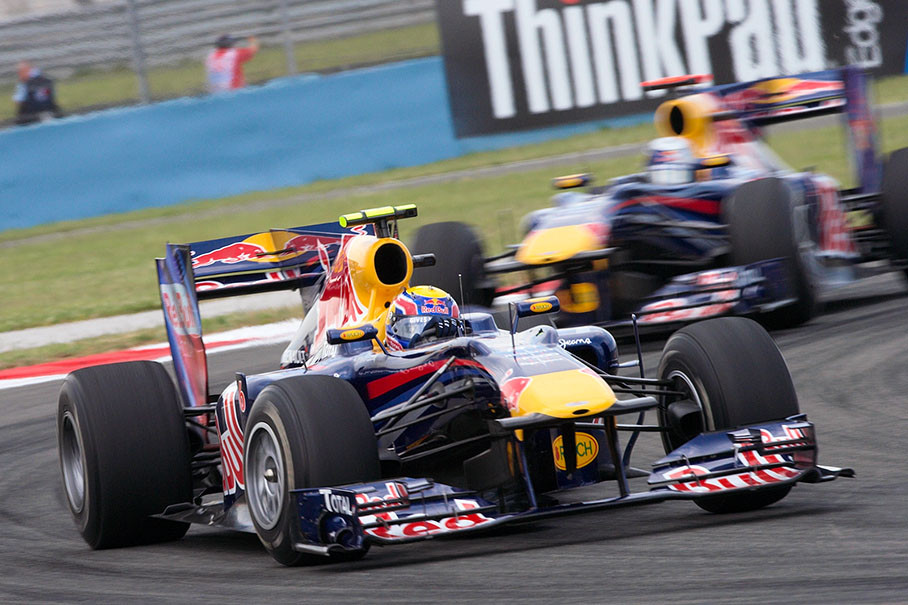 Race leader Mark Webber, Red Bull Racing, closely in front of team mate Sebastian Vettel