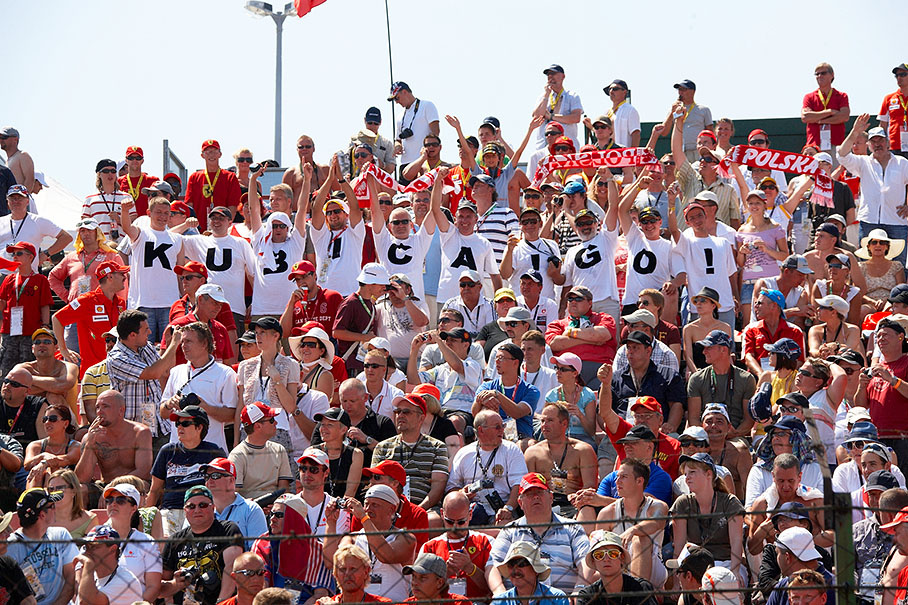 Kubica's fans cheer on a grandstand