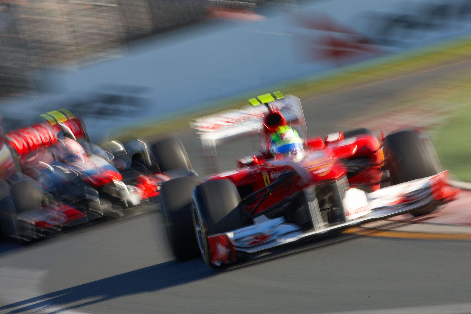 Felipe Massa, Ferrari, in front of Button's McLaren