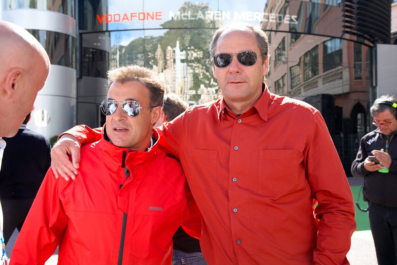 Jean Alesi poses with Gerhard Berger in the paddock