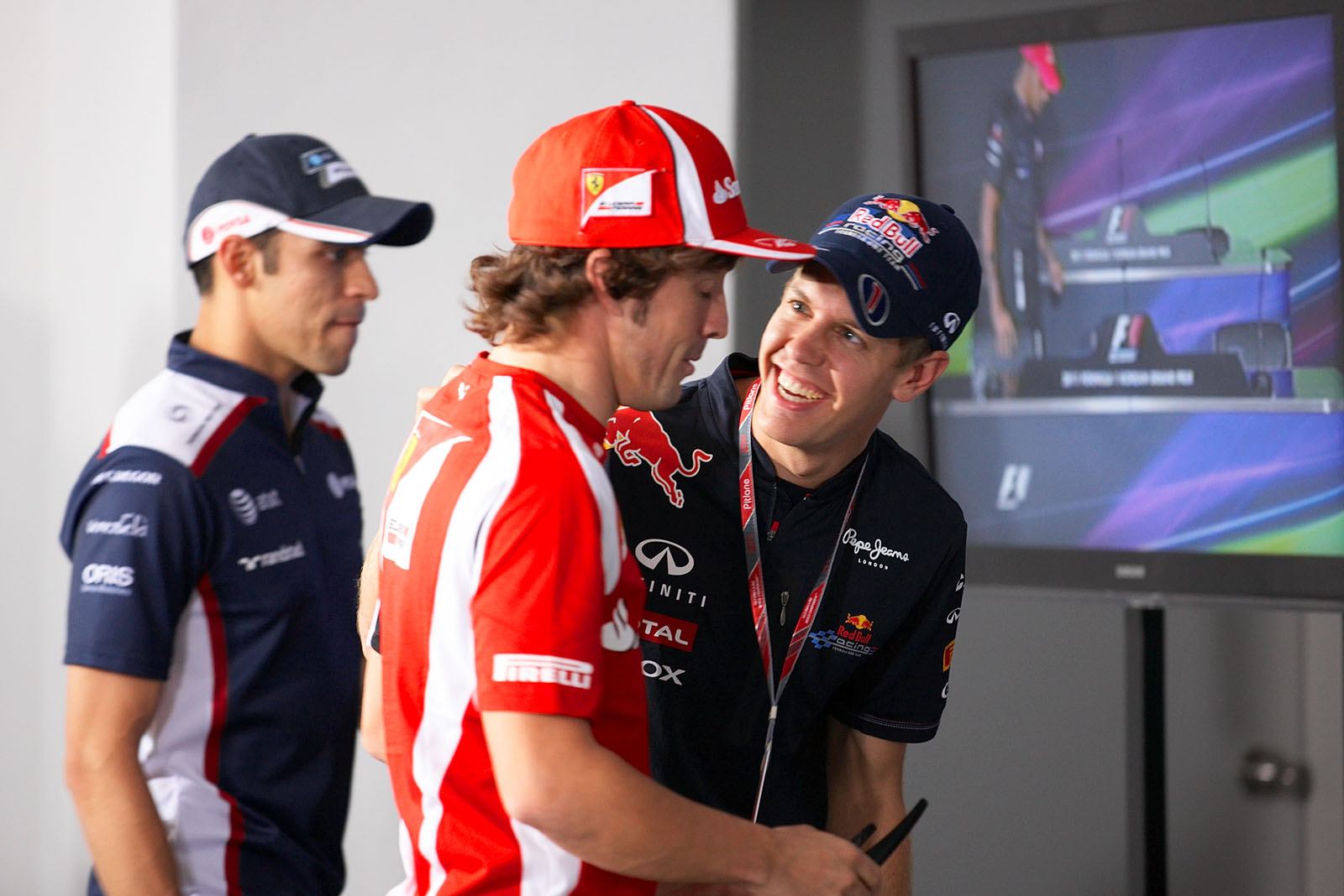 Sebastian Vettel teases Fernando Alonso before the Thursday press conference