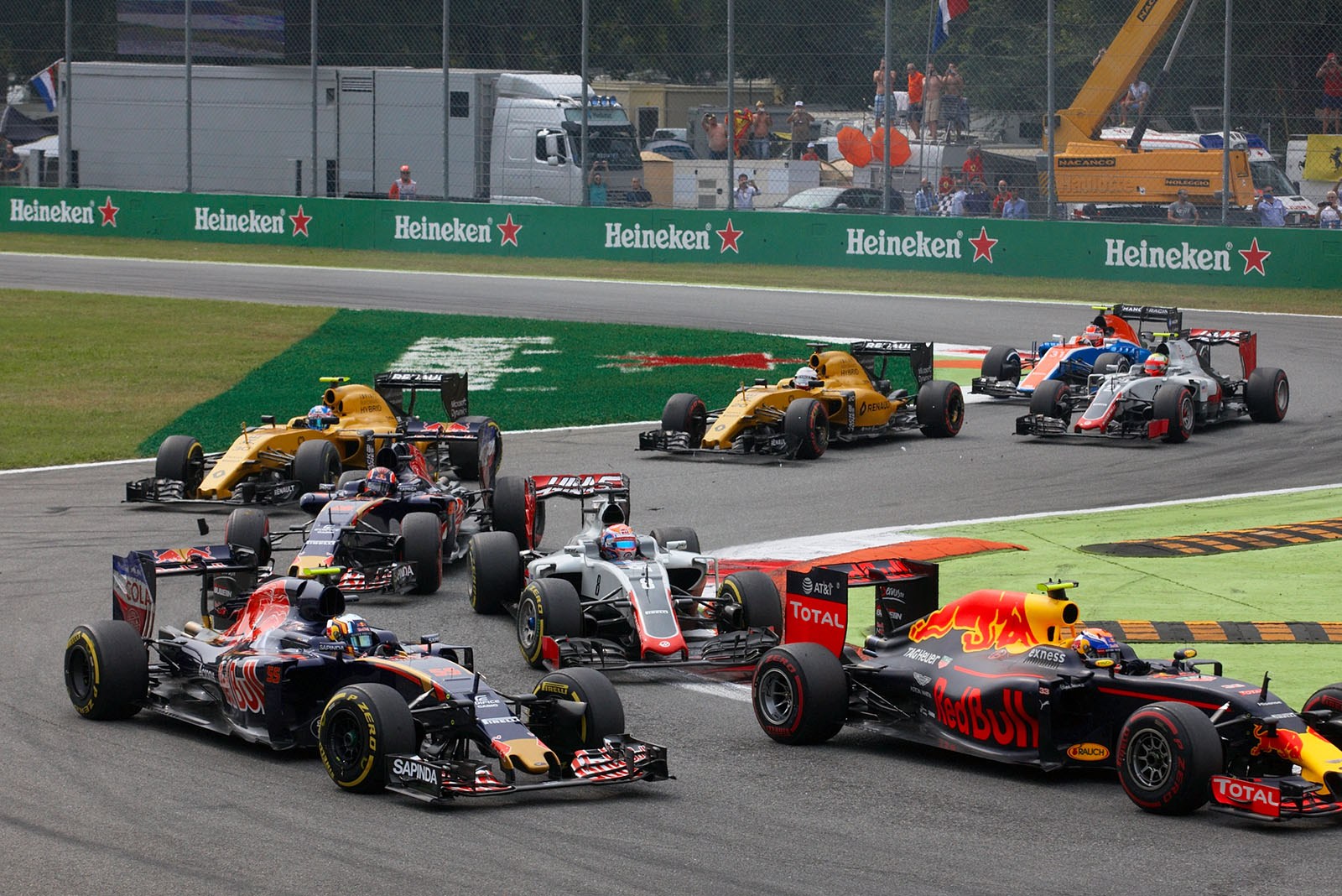 The backmarkers with Verstappen (Red Bull), Sainz (Toro Rosso), Grosjean (Haas), Kvyat and both Renault, Monza, Italian Grand Prix, 2016