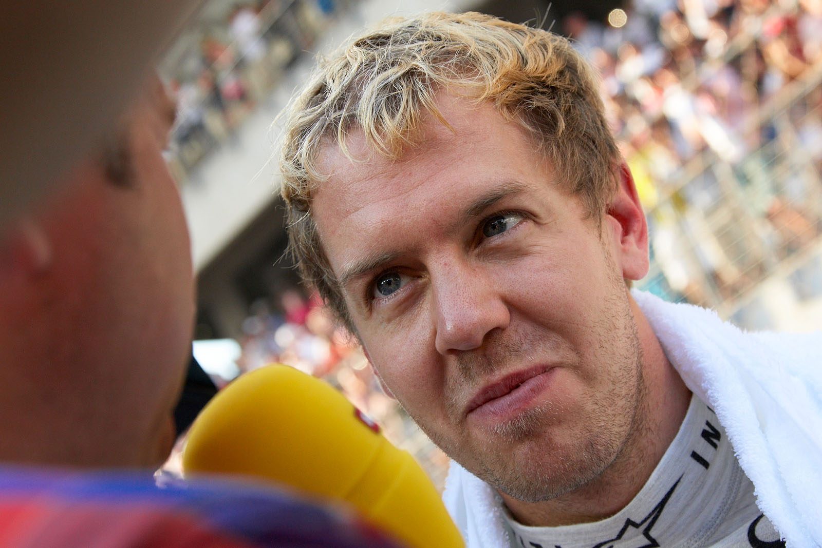 German RTL presenter Kai Ebel interviews Sebastian Vettel on the grid