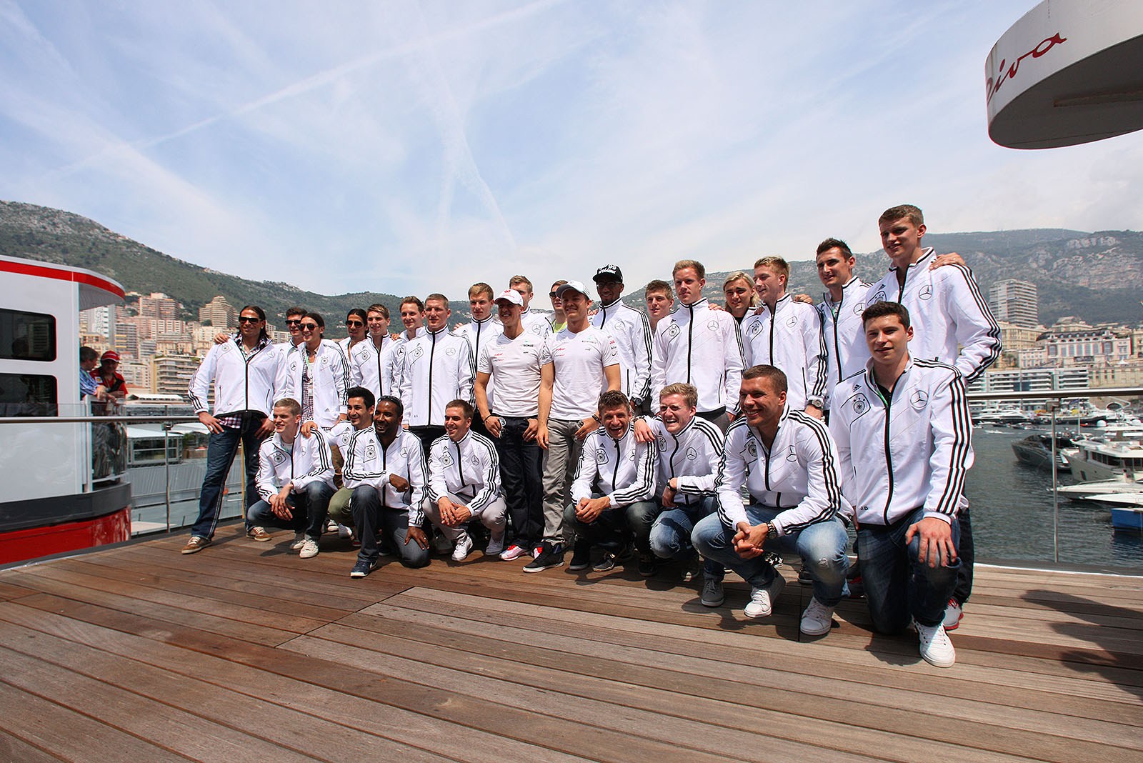 The German national football team visits Mercedes GP in Monaco and poses for a group photo