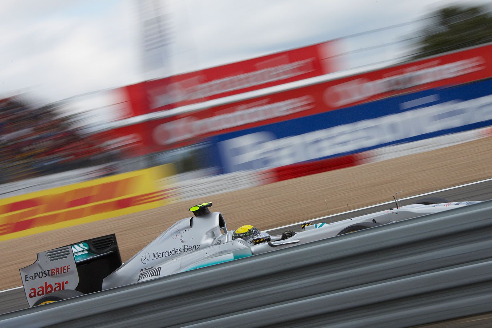 Nico Rosberg, Mercedes GP, between railing and billboards