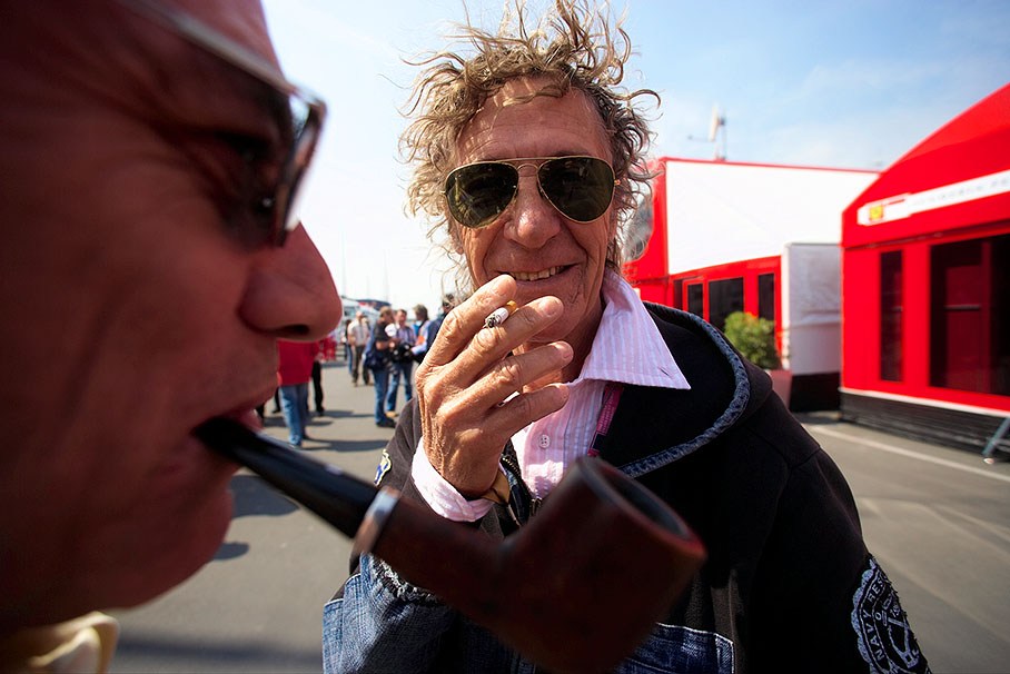 Ex-Marlboro cowboy Arturo Merzario smoking with a kindred spirit